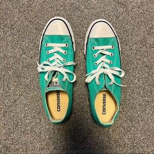 Teal Converse. Men’s 7.5, women’s 9.5.